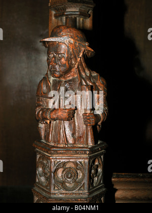 La prédication figure sur un contrefort des stalles sculptées de la fin 1520 c dans la chapelle de la cathédrale de Winchester Hampshire Banque D'Images