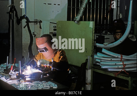 Soudure de l'homme et la fabrication d'une location à Taiwan Banque D'Images