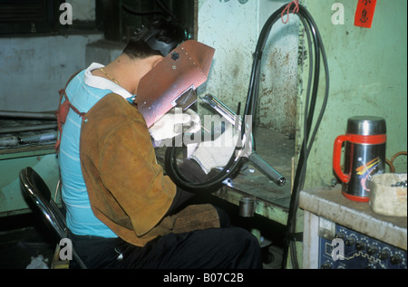 Soudure de l'homme et la fabrication d'une location à Taiwan Banque D'Images