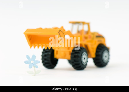 Fleur approche bulldozer jouet Banque D'Images