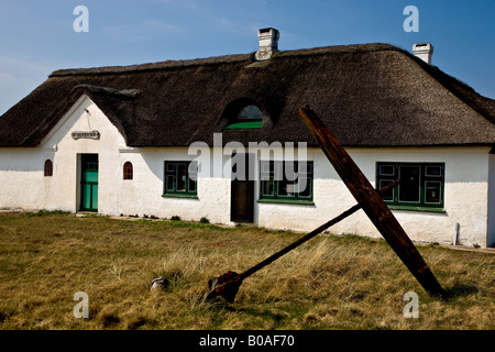 Ancienne chaumière ferme à la côte ouest danoise Banque D'Images
