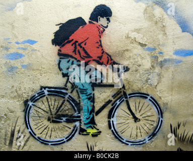 Bike rider avec sac à dos : une image de la boîte, un Festival London street artiste graffito exposition Banksy a aidé à ouvrir Banque D'Images