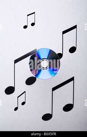 Des notes de musique et un CD suspendue en l'air Banque D'Images