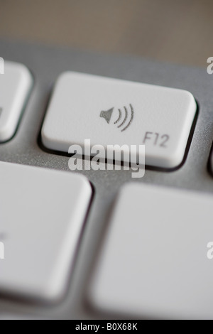 Extreme close up de touche de volume d'aide du clavier de votre ordinateur. Banque D'Images