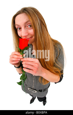 Les jeunes femmes avec une rose rouge Banque D'Images