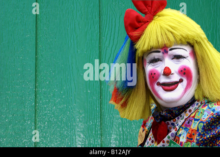 Clown de cirque américain professionnel isolés contre fond vert Banque D'Images