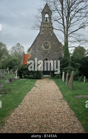 L'angleterre église cimetière mur silex eton norman vieux murs Banque D'Images