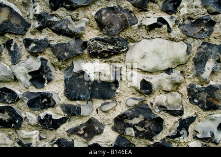 L'angleterre église cimetière mur silex eton norman vieux murs Banque D'Images