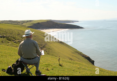 Peinture artiste Dunraven Bay Côte Banque D'Images