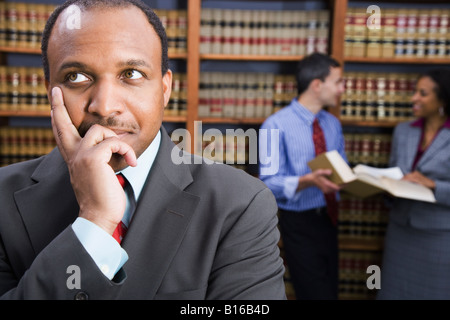 African American businessman in library Banque D'Images