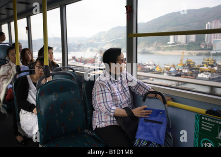 Les femmes dans un bus à Hong Kong, Chine Banque D'Images