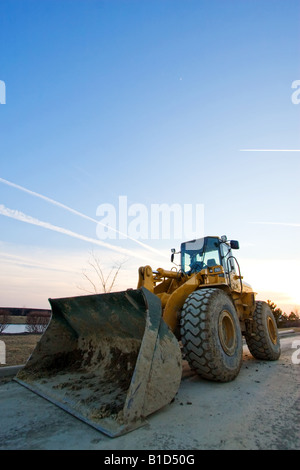 Un chargeur avant sur un site de construction. Banque D'Images