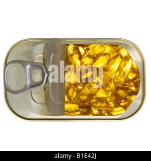 Des capsules d'huile de poisson dans un anneau d'étain. vue en plan découpe découpe Banque D'Images