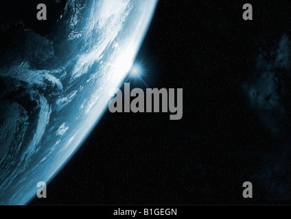 Lever de soleil derrière la Terre dans l'espace Banque D'Images