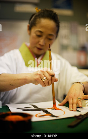 Calligrahy japonais démontre son art principal Banque D'Images