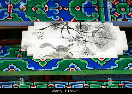 Une fresque peinte sur le pont à la Black Dragon Pool, Lijiang, Yunnan, Chine Banque D'Images