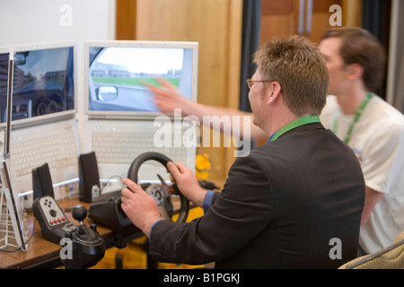 La conduite d'une simulation par ordinateur du programme utilisé pour montrer comment les conducteurs à conduire plus efficacement à l'avenir conférence Maisons Banque D'Images