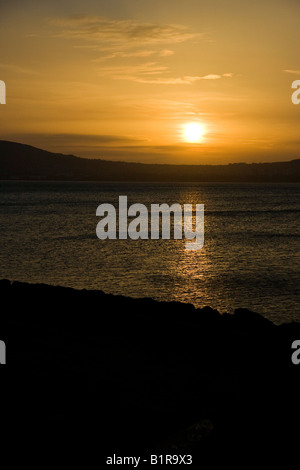 Le soleil se couche sur le lac de Belfast en mai Banque D'Images