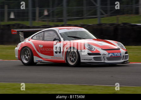 Porsche 997 GT3 voiture de course Sport quitter Old Hall Corner Oulton Park Motor Racing Circuit Cheshire England Royaume-Uni Banque D'Images