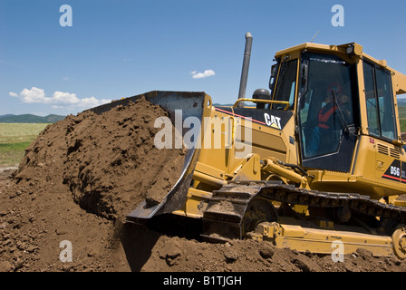 Bouteur Caterpillar D5G, ce creusement, Steamboat Springs, Colorado. Banque D'Images