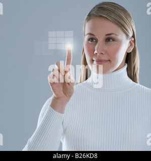 Affichage lumineux de femme Banque D'Images