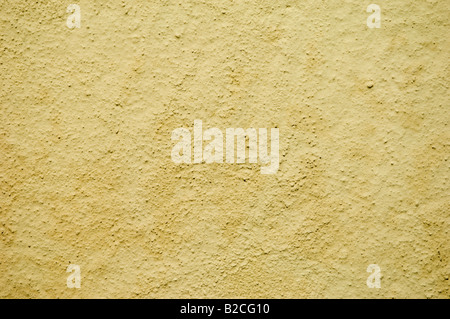 Détail d'un mur jaune robuste Banque D'Images