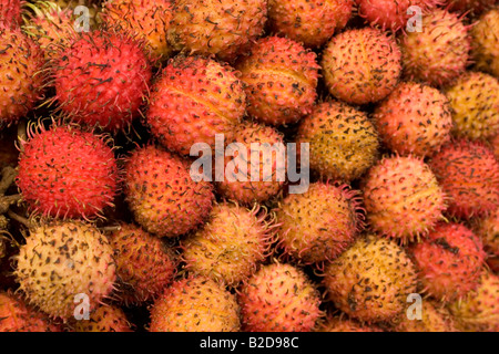 Ramboutan en vente sur un étal de marché à Ho Chi Minh Ville (Saigon) au Vietnam. Banque D'Images