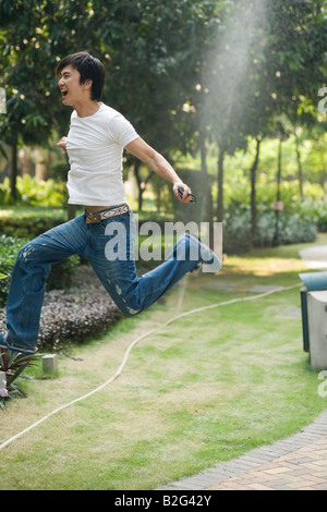 Portrait of a young man in a park Banque D'Images