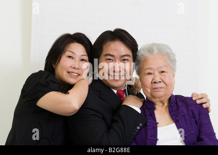 Portrait of a senior woman with her children and smiling Banque D'Images