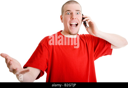 Jeune homme ravi d'un téléphone mobile téléphone telephon conversation les gens Banque D'Images