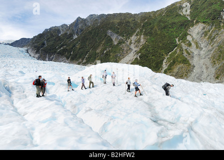 Wanderers glace touristes Fox Glacier NP Westland National Park au sud ouest de la Nouvelle-Zélande paysage paysage de neige femme de glace Banque D'Images