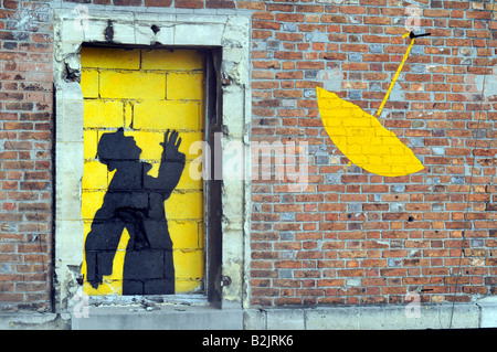 Street art montrant une silhouette homme ayant son parapluie soufflée dans le centre de Paris, France Banque D'Images