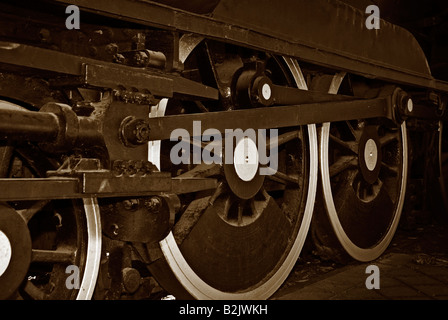 De grandes roues de locomotives à vapeur libre de droit grunge style sépia Banque D'Images