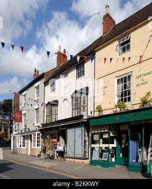 Boutiques dans High street Alcester Warwickshire U K Banque D'Images