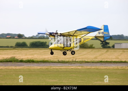 Thruster T600N-450-G Sprint OMAL micrilight le décollage d'aéronefs de l'Aérodrome Wickenby Banque D'Images