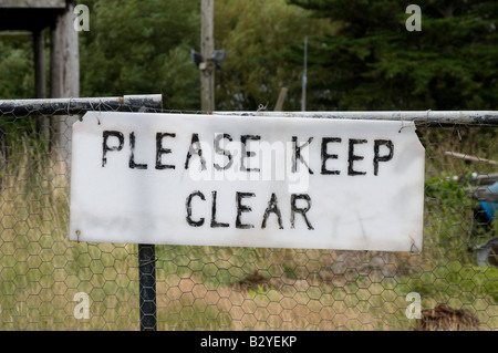 Veuillez conserver l'avis clair sur la porte d'entrée Banque D'Images