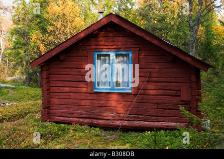 Log Cabin dans la forêt Banque D'Images