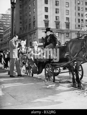 Équitation de Style - conducteur de chariot à Grand Army Plaza (bord de Central Park) se préparer à prendre les clients à travers le parc Banque D'Images