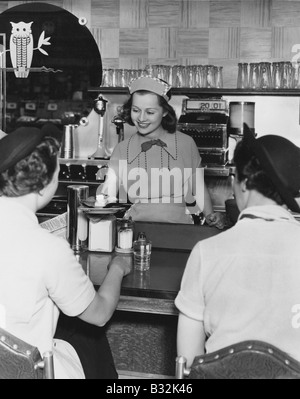 Service avec un sourire Banque D'Images