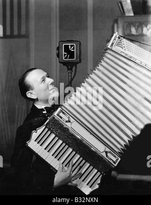 Homme jouant de l'accordéon Banque D'Images