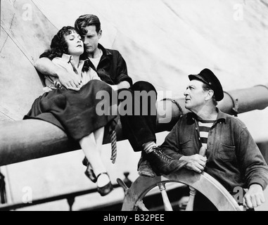 Couple et l'homme volant voilier Banque D'Images