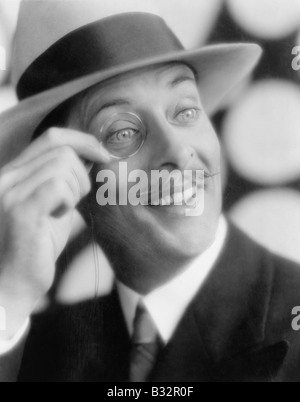 Cheerful man with monocle Banque D'Images