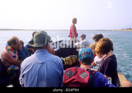 Ferry pour l'île de tête Scolt passagers Norfolk yacht maison de vacances côte de la mer du Nord tourisme touristes coastal East Anglia Angleterre UK Banque D'Images