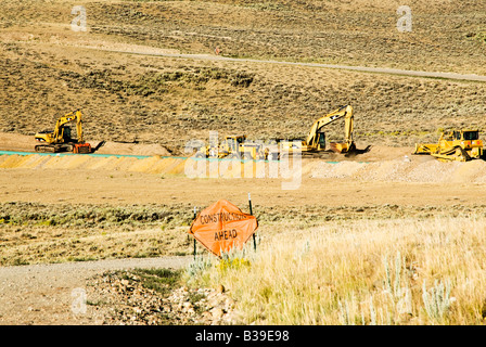 La construction de pipelines à travers un champ de gaz dans le Wyoming Banque D'Images