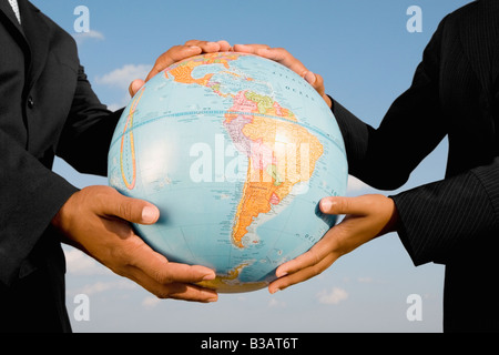 African Woman holding globe Banque D'Images