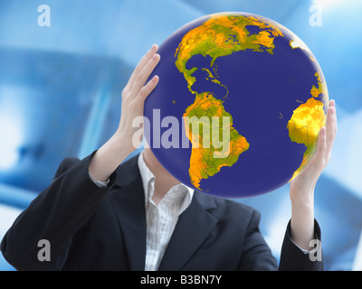 Woman Holding Earth Banque D'Images