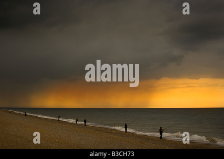 Pêche en mer avec la tige et la ligne Claj Norfolk UK Août Banque D'Images