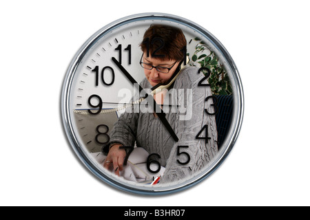 Le travail de bureau et d'une horloge Banque D'Images