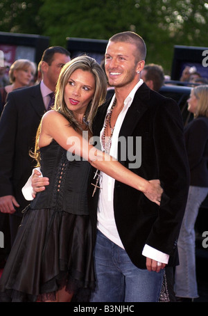 David Beckham et sa femme Victoria arrivent à la partie 19 Avril 2004 Banque D'Images