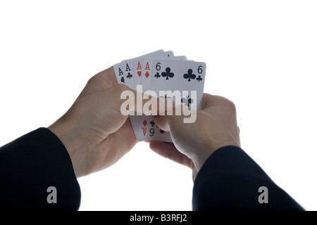 Businessman having quatre d'une sorte d'as en jouant au poker Banque D'Images